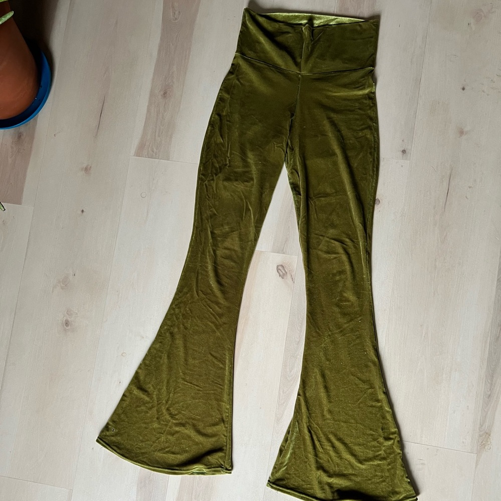 Home cooked Karma velvet flare pants in avocado green